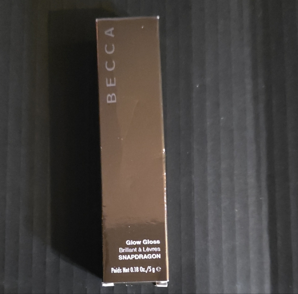 BECCA Glow Gloss in Sleek Black Packaging